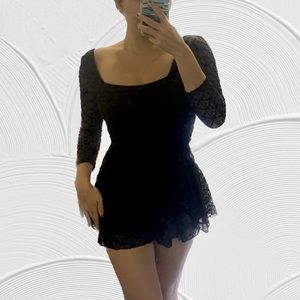 UO cross back lace romper